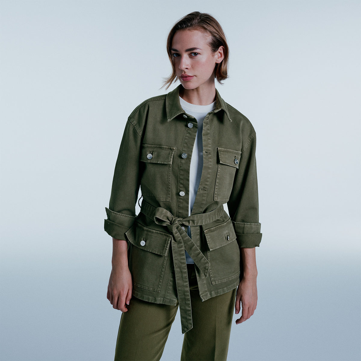 Utility jacket with jeans and black knee high boots